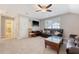 Spacious living room with a comfortable couch, TV, and a window for natural light at 347 Prestwick Ct, Summerville, SC 29483