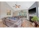Bright living room features vaulted ceilings, a fireplace, and seamless access to the sunroom at 347 Prestwick Ct, Summerville, SC 29483