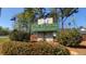Pine Forest Country Club sign with lush shrubbery at 347 Prestwick Ct, Summerville, SC 29483