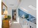 Upstairs hallway features decor and a view through an open door into a bedroom at 3510 Deer Run Rd, Seabrook Island, SC 29455