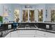 Updated kitchen counter with granite countertops and natural lighting, showcasing modern appliances at 3510 Deer Run Rd, Seabrook Island, SC 29455
