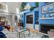 Open-concept living room featuring a fireplace, comfortable seating, and built-in shelving at 3510 Deer Run Rd, Seabrook Island, SC 29455