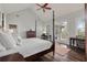 Bedroom featuring wood floors, ceiling fan, and an access door to the outside patio at 37 Marsh Edge, Kiawah Island, SC 29455