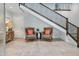Inviting foyer with tiled flooring, a staircase, and comfortable seating at 37 Marsh Edge, Kiawah Island, SC 29455