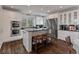 Beautiful kitchen with stainless appliances, granite countertops and island with breakfast bar at 37 Marsh Edge, Kiawah Island, SC 29455