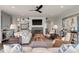 Comfortable living room with fireplace, ceiling fan, recessed lighting, and stylish decor at 37 Marsh Edge, Kiawah Island, SC 29455