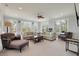 Spacious living room with lots of windows and recessed lighting throughout at 37 Marsh Edge, Kiawah Island, SC 29455