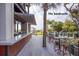 Charming outdoor bar area with seating and scenic views of the grounds and beach at 37 Marsh Edge, Kiawah Island, SC 29455