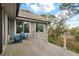 Nice patio with gray wood planks and two blue chairs with a great view of the landscape at 37 Marsh Edge, Kiawah Island, SC 29455
