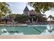 Resort-style pool with lounge chairs and umbrellas, offering a relaxing outdoor experience at 37 Marsh Edge, Kiawah Island, SC 29455
