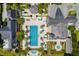 Aerial view showcasing the large swimming pool, seating area, and landscaping at the Sports Pavilion at 37 Marsh Edge, Kiawah Island, SC 29455