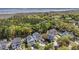 Aerial shot of homes surrounded by lush greenery; some properties feature private pools in backyard at 3717 Tip Ln, Mount Pleasant, SC 29466