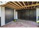 Spacious outdoor basement area with brick flooring and a wooden beamed ceiling at 3717 Tip Ln, Mount Pleasant, SC 29466
