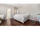 Spacious bedroom featuring hardwood floors, a ceiling fan, and natural light at 3717 Tip Ln, Mount Pleasant, SC 29466