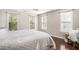 Bright bedroom with three large windows and hardwood floors at 3717 Tip Ln, Mount Pleasant, SC 29466