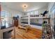 Spacious bedroom with built-in bunk beds, hardwood floors, and cheerful decor at 409 W Indian Ave, Folly Beach, SC 29439