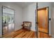 Bright hallway featuring a wooden bench and access to the elevator at 409 W Indian Ave, Folly Beach, SC 29439
