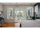 Light-filled main bedroom features an open-air private porch at 409 W Indian Ave, Folly Beach, SC 29439