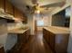 Functional kitchen space with wood cabinets and ample countertop area at 411 Navaho Cir, Summerville, SC 29483