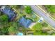 An aerial view of a home showing the landscaping, pool and roof at 4407 Wild Thicket Ln, North Charleston, SC 29420