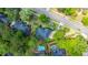 Aerial view of a backyard with a swimming pool and beautiful landscaping at 4407 Wild Thicket Ln, North Charleston, SC 29420