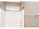 Clean bathroom with shower, small window, and neutral wall paint at 4407 Wild Thicket Ln, North Charleston, SC 29420