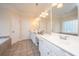 Bright bathroom featuring double sinks, ample counter space, and a separate vanity area at 4407 Wild Thicket Ln, North Charleston, SC 29420