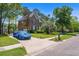 Spacious home on a tree lined street with a long driveway and beautiful curb appeal at 4407 Wild Thicket Ln, North Charleston, SC 29420