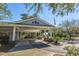 Beautiful building entrance with covered entryway, showcasing architectural details and landscaping at 4407 Wild Thicket Ln, North Charleston, SC 29420