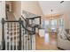 Open-concept foyer with staircase views of the kitchen and dining area, showcasing the home's layout at 4407 Wild Thicket Ln, North Charleston, SC 29420