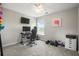 Bedroom with a gaming setup, gray walls, carpet flooring, a ceiling fan, and a window at 476 Foxbank Plantation Blvd, Moncks Corner, SC 29461