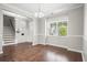 Bright dining room with hardwood floors, natural light, and view to the outdoor landscape at 476 Foxbank Plantation Blvd, Moncks Corner, SC 29461