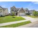 Lovely two-story home featuring a well-maintained lawn and convenient attached two-car garage at 476 Foxbank Plantation Blvd, Moncks Corner, SC 29461