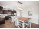 Kitchen with island seating features stainless appliances and eat-in breakfast area at 476 Foxbank Plantation Blvd, Moncks Corner, SC 29461