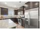 Kitchen features stainless steel appliances, gas range, granite countertops, and dark cabinets at 476 Foxbank Plantation Blvd, Moncks Corner, SC 29461
