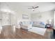 Cozy living room features hardwood floors, ceiling fan and ample natural light at 476 Foxbank Plantation Blvd, Moncks Corner, SC 29461