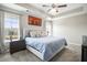Spacious bedroom featuring neutral walls, carpet flooring, a ceiling fan and bright windows with a view at 476 Foxbank Plantation Blvd, Moncks Corner, SC 29461