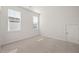 Empty bedroom with ample natural light streaming through the windows, ready for personalization at 500 W Respite Ln, Summerville, SC 29483