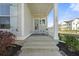 Inviting front porch with a chair and decorative welcome mat to greet guests at 500 W Respite Ln, Summerville, SC 29483
