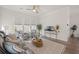 Comfortable living room featuring hardwood floors, a ceiling fan, and stylish decor at 500 W Respite Ln, Summerville, SC 29483
