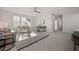 Spacious living room with natural light, modern furniture, and a decorative rug at 500 W Respite Ln, Summerville, SC 29483