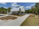Community pool house with outdoor seating, pool view, and landscaping at 500 W Respite Ln, Summerville, SC 29483