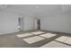 The carpeted primary bedroom gets plenty of natural light at 553 Richfield Way, Summerville, SC 29486