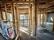 Exposed framing shows the space's potential; ready for new insulation, and flooring at 5901 Sedgefield Dr, Hanahan, SC 29410