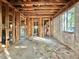 Interior framing shows the space's bare bones, ready to be transformed with insulation, floors, and drywall at 5901 Sedgefield Dr, Hanahan, SC 29410