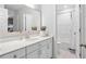 Bright bathroom with a white vanity, stylish mirror, and a convenient shower and toilet area at 606 Dunswell Dr, Summerville, SC 29486