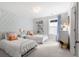 Cozy bedroom with two twin beds, a window, and stylish decor at 606 Dunswell Dr, Summerville, SC 29486