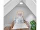 Charming nook under eaves with a comfortable bed and decorative accents, made just for dogs at 606 Dunswell Dr, Summerville, SC 29486