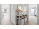 Hallway with console table, decorative mirror, and access to bedrooms at 606 Dunswell Dr, Summerville, SC 29486