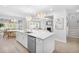 Bright, modern kitchen with stainless appliances, quartz countertops, and a large island for seating at 606 Dunswell Dr, Summerville, SC 29486